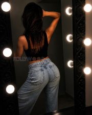 Seductive Seerat Kapoor Cleavage in a Black Deep V Halter Crop Top and Jeans Photos 03