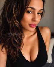 Seductive Seerat Kapoor Cleavage in a Black Deep V Halter Crop Top and Jeans Photos 04