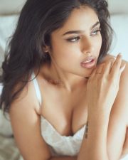 Sensuous Erotic Faria Abdullah in a White Lace Corset Top and Matching Shorts Photos 01