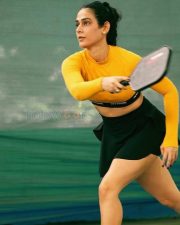 Sexy Aakanksha Singh Thighs in a Black Mini Skirt and Yellow Crop Top Playing Pickleball Photos 03