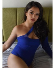 Sizzling Ahsaas Channa in a Blue One Piece On the Bed Photoshoot Pictures 02