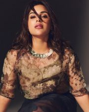 South Indian Actress Samyuktha Menon in a Bohemian Style Printed Organza Blouse with a High Waisted Skirt Photos 02