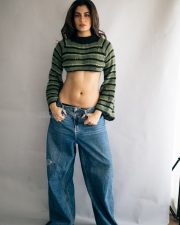 Stylish Actress Shreya Dhanwanthary in a Green Striped Crop Sweater Photos 02