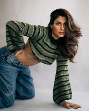 Stylish Actress Shreya Dhanwanthary in a Green Striped Crop Sweater Photos 03