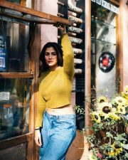 Stylish Shreya Dhanwanthary in an Olive Green Crop Top and Blue Jeans Photos 03