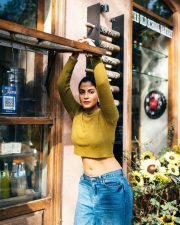 Stylish Shreya Dhanwanthary in an Olive Green Crop Top and Blue Jeans Photos 04