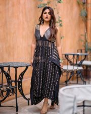 Swayambhu Heroine Samyuktha Menon in a Black Tamma Brocade Silk Pleated Dress Pictures 02