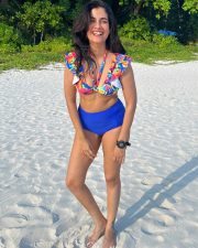 Vibrant Actress Shreya Dhanwanthary in a colorful floral top and blue shorts Photos 01