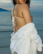 Vishwambara Actress Ramya Pasupuleti in a Red and White Bikini Top with a White Pant and Shirt Photos 01
