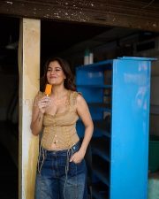 Winsome Actress Shreya Dhanwanthary in a Tan Lace Up Corset Top and Wide Leg Blue Jeans Photos 04