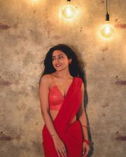 Bold and Beautiful Avantika Mishra in a Red Saree with a Sleeveless Thin Strap Blouse Photos 01