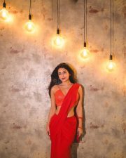 Bold and Beautiful Avantika Mishra in a Red Saree with a Sleeveless Thin Strap Blouse Photos 03