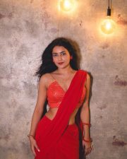 Bold and Beautiful Avantika Mishra in a Red Saree with a Sleeveless Thin Strap Blouse Photos 04