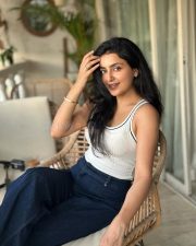 Delightful Actress Avantika Mishra in a White Ribbed Tank Top Photos 01