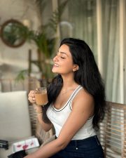 Delightful Actress Avantika Mishra in a White Ribbed Tank Top Photos 02