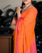 Tollywood Actress Rashmi Gautam in an Orange Saree Photos 03