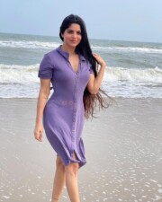 Beautiful Divya Bharathi in a Lavender Knee Length Dress at the Beach Photos 02