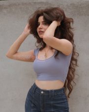 Charming Actress Divya Bharathi in a Lavender Ribbed Crop Top and Blue Jeans Photos 01