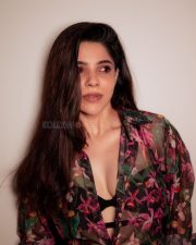 Charming Divya Bharathi in a Floral Printed Sheer Top over a Black Bralette and a Black Skirt Pictures 02