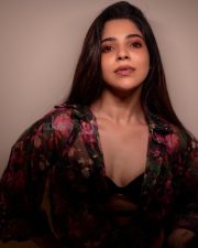 Charming Divya Bharathi in a Floral Printed Sheer Top over a Black Bralette and a Black Skirt Pictures 03