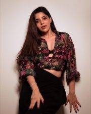 Charming Divya Bharathi in a Floral Printed Sheer Top over a Black Bralette and a Black Skirt Pictures 04