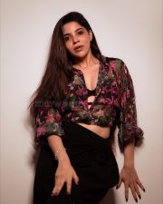 Charming Divya Bharathi in a Floral Printed Sheer Top over a Black Bralette and a Black Skirt Pictures 04
