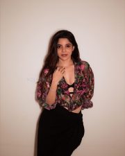 Charming Divya Bharathi in a Floral Printed Sheer Top over a Black Bralette and a Black Skirt Pictures 05