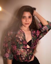 Charming Divya Bharathi in a Floral Printed Sheer Top over a Black Bralette and a Black Skirt Pictures 06