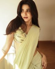 Elegant Beauty Divya Bharathi in a Pastel Green Stylish Saree with an Embroidered Sleeveless Blouse Photos 02