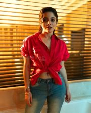 Glam Divya Bharathi Navel in a Red Front Tie Up Shirt and Jeans Photos 03