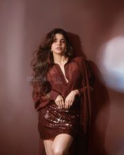 Glamorous Divya Bharathi in a Maroon Two Piece Outfit with a Button Down Shirt and Sequin Mini Skirt Photos 01