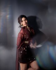 Glamorous Divya Bharathi in a Maroon Two Piece Outfit with a Button Down Shirt and Sequin Mini Skirt Photos 02