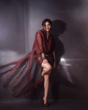 Glamorous Divya Bharathi in a Maroon Two Piece Outfit with a Button Down Shirt and Sequin Mini Skirt Photos 07