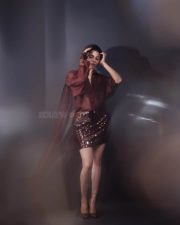 Glamorous Divya Bharathi in a Maroon Two Piece Outfit with a Button Down Shirt and Sequin Mini Skirt Photos 09
