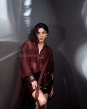 Glamorous Divya Bharathi in a Maroon Two Piece Outfit with a Button Down Shirt and Sequin Mini Skirt Photos 10