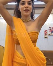 Glamorous Divya Bharathi in a Yellow Saree and Strapless Blouse Pictures 02