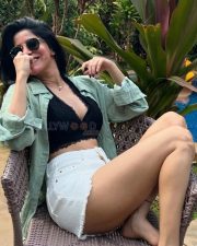 Hottie Divya Bharathi in a Black Bralette and White Mini Shorts with a Pale Green Shirt Photos 01