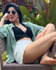 Hottie Divya Bharathi in a Black Bralette and White Mini Shorts with a Pale Green Shirt Photos 03