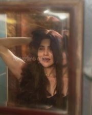 Magnetic Actress Divya Bharathi in a Black Crop Top And Mustard Satin Skirt Photos 01