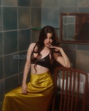 Magnetic Actress Divya Bharathi in a Black Crop Top And Mustard Satin Skirt Photos 04