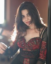 Mysterious Actress Divya Bharathi in a Red Embroidered Bustier with Black Sheer Overlay Skirt Photos 04