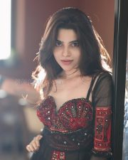 Mysterious Actress Divya Bharathi in a Red Embroidered Bustier with Black Sheer Overlay Skirt Photos 05