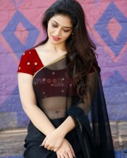 Priyanka Jawalkar Showing Navel in a Transparent Black Saree Photo 01