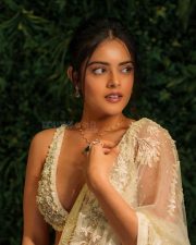 Sensuous Riddhi Kumar in an Off White Floral Embroidered Net Saree with a Sleeveless Bustier Blouse Photos 09