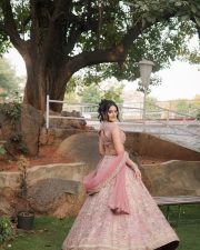 Superboys of Malegaon Actress Riddhi Kumar in a Rose Pink Floral Embroidered Silk Choli with a High Waisted Lehenga Skirt and Net Dupatta Photos 06