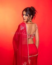 The RajaSaab Actress Riddhi Kumar in a Crimson Red Saree with a Red Sleeveless Blouse with a U Shaped Neckline Pictures 02