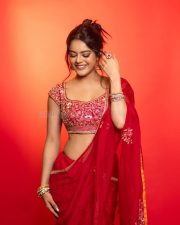 The RajaSaab Actress Riddhi Kumar in a Crimson Red Saree with a Red Sleeveless Blouse with a U Shaped Neckline Pictures 08