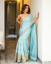 Beautiful Nisha Aggarwal in a Sky Blue Pleated Saree with a Sleeveless Embroidered Blouse Photos 02