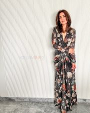 Elegant Nisha Aggarwal in a Pleated Maxi Dress Photos 01