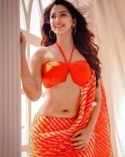 Actress and Model Eshanya Maheshwari Beautiful in Orange Dress 01
